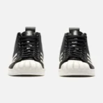 Front view of Thug Club X Adidas Originals Superstar Black Boot Luxe