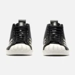 Front view of Thug Club X Adidas Originals Superstar Black Boot Luxe