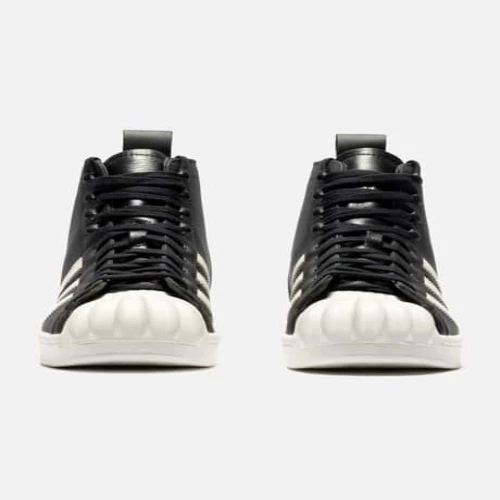Front view of Thug Club X Adidas Originals Superstar Black Boot Luxe
